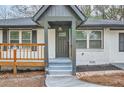 Inviting front porch and a well-maintained exterior at 2091 Parker Ranch Se Rd, Atlanta, GA 30316