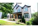 Charming two-story home with stone accents and a welcoming front porch at 3306 Chastain Ridge Dr, Marietta, GA 30066