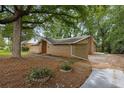 Brick exterior with driveway provides ample parking at 4701 Riverwood Cir, Decatur, GA 30035