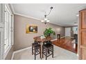 Cozy dining area featuring tile floors, natural light and neutral wall decor at 331 Lakemoore Ne Dr # C, Atlanta, GA 30342