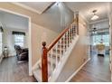 Welcoming entryway with a staircase and hardwood floors leading to the living areas at 1900 Shady Creek Ln, Lawrenceville, GA 30043