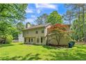 A spacious backyard with lush green grass at 745 Birchberry Sw Ter, Atlanta, GA 30331