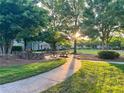 Picturesque community park featuring picnic tables, lush greenery, and walking paths at 3219 Colchester St, Douglasville, GA 30135