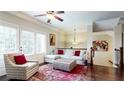 Cozy living room with a plush sofa and ample natural light at 1263 Linden Ne Ct, Atlanta, GA 30329