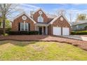 Charming two-story brick home with a two-car garage and a traditional design at 2269 Howell Farms Nw Trl, Acworth, GA 30101