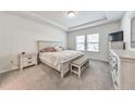 Serene bedroom with tray ceiling, neutral colors, and plenty of closet space at 316 Denali Butte Ter, Canton, GA 30114