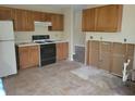 Kitchen featuring an oven, and upper cabinets at 1119 Oakwood Manor Ct, Decatur, GA 30032