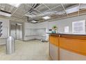 Building lobby area featuring mailboxes, a reception desk, and service announcements at 130 26Th St # 706, Atlanta, GA 30309