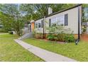 A charming, renovated single-story house with fresh landscaping and a cozy, inviting appeal at 992 Estes Sw Dr, Atlanta, GA 30310