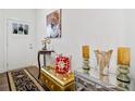 Inviting entryway with stylish decor, elegant bench, and decorative accents at 2142 Arnage Dr, Lithonia, GA 30058