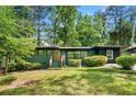 Charming exterior of this renovated home with a well-maintained yard and inviting curb appeal at 1760 Detroit Nw Ave, Atlanta, GA 30314