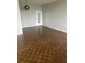 Bright living room with parquet flooring and a glass panel door at 3060 Pharr N Ct # 607, Atlanta, GA 30305
