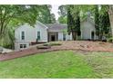 Charming home featuring manicured landscaping and a classic facade, creating inviting curb appeal at 3003 Heavenly Ln, Snellville, GA 30078