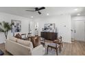 Bright living room boasts stylish furniture, modern decor, and an open floor plan at 3634 Oakleaf Pass, Fairburn, GA 30213