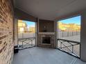 The screened-in porch has a fireplace and nice views at 3566 Andover Way, Buford, GA 30519