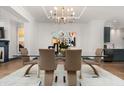 Elegant dining room with a modern chandelier and sleek table at 190 Centennial Way, Atlanta, GA 30313