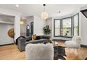 Comfortable living room with hardwood floors, stylish furnishings, and ample natural light at 190 Centennial Way, Atlanta, GA 30313