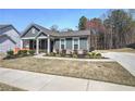 Charming home with well-maintained lawn and landscape at 34 Mountainbrook Nw Dr, Cartersville, GA 30121