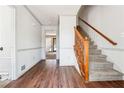 Inviting foyer with hardwood floors, staircase and neutral decor offering a bright and airy entrance at 1366 Maple Ridge Dr, Suwanee, GA 30024