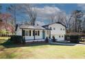 Beautifully updated home showcasing a well-maintained lawn, with charming curb appeal at 1616 W Kellogg Cir, Douglasville, GA 30134