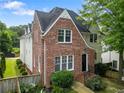 Beautiful brick home with a well-maintained lawn, lush landscaping, and a wooden fence in a great location at 2685 Grady Se St, Smyrna, GA 30080