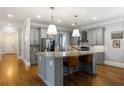 Spacious kitchen featuring granite countertops, stainless steel appliances, and island seating at 2685 Grady Se St, Smyrna, GA 30080