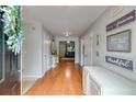 Bright entryway showcasing hardwood floors, fresh paint, and decorative accents at 5069 Luxford Dr, Douglasville, GA 30135