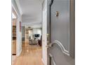 Inviting entryway showcasing hardwood floors and a glimpse of the living room at 175 15Th Ne St # 304, Atlanta, GA 30309