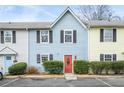 Charming exterior of a two-story home with a well-maintained front yard and colorful front door at 2859 Spring Villa Se Ln, Smyrna, GA 30080
