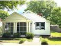 Beautiful home with a cozy screened in porch and traditional architectural details at 5091 Newark Ave, Clarkdale, GA 30111