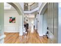 Welcoming foyer with hardwood floors, staircase, and arched doorways at 1897 8Th St, Atlanta, GA 30341