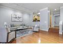 Inviting living room featuring hardwood floors, neutral colors and natural light at 273 12Th Ne St # 421, Atlanta, GA 30309
