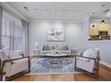 Bright living room featuring hardwood floors, neutral colors and natural light at 273 12Th Ne St # 421, Atlanta, GA 30309