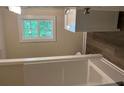 Bathroom features a tub/shower combo and a single sink vanity at 97 East Rd, Covington, GA 30016