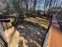 View of the backyard featuring a sport court and storage shed at 6542 Cherry Tree Ln, Atlanta, GA 30328