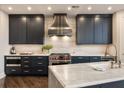 Gourmet kitchen featuring marble countertops, custom cabinetry, and professional-grade stainless steel appliances at 3344 Peachtree Ne Rd # 3005, Atlanta, GA 30326