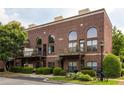 Modern brick townhome featuring private balconies and well-manicured landscaping at 791 Wylie Se St # 911, Atlanta, GA 30316