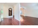 Bright entryway with hardwood floors and a view into the dining and living areas at 1259 Crescentwood Ln, Decatur, GA 30032