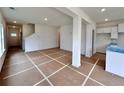 Expansive living area with an open floor plan leading into the kitchen area at 1956 Asher Ln # 51, Conyers, GA 30013