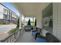 Relaxing front porch featuring comfortable outdoor seating, perfect for enjoying the neighborhood views at 224 Bass Sw St, Atlanta, GA 30315