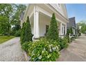Inviting front porch with lush landscaping, offering a charming view of the neighborhood at 224 Bass Sw St, Atlanta, GA 30315
