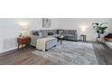 Comfortable living room with modern furnishings, area rug, and natural light, offering a stylish living space at 234 Pam Sw Ln, Marietta, GA 30064