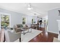 Open-concept floor plan with hardwood floors, and living area leading to the kitchen at 655 Mead Se St # 79, Atlanta, GA 30312