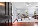 Inviting living room with hardwood floors, large windows and plenty of natural light at 655 Mead Se St # 79, Atlanta, GA 30312