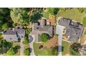 Aerial view showcases the property, surrounding landscape, and neighborhood layout at 11155 Highfield Chase Dr, Johns Creek, GA 30097
