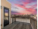 Breathtaking rooftop deck offers panoramic city views and tranquil sunset vistas at 791 Wylie Se St # 912, Atlanta, GA 30316