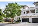 Striking modern home with garage and balcony; note the minimalist design and clean facade at 520 Wabash Ne Ave # B, Atlanta, GA 30312