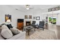 Bright living room with fireplace, neutral paint, and plenty of space for relaxing and entertaining at 1914 Lakeshore Overlook Nw Cir, Kennesaw, GA 30152