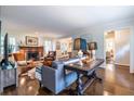 Cozy living room featuring a fireplace and hardwood floors, creating a warm and inviting atmosphere for gatherings at 2469 Elizabeth Ann Ne Ln, Atlanta, GA 30324