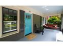 Inviting front porch with a swing, stylish decor, and views of the surrounding neighborhood at 416 2Nd Ave, Decatur, GA 30030
